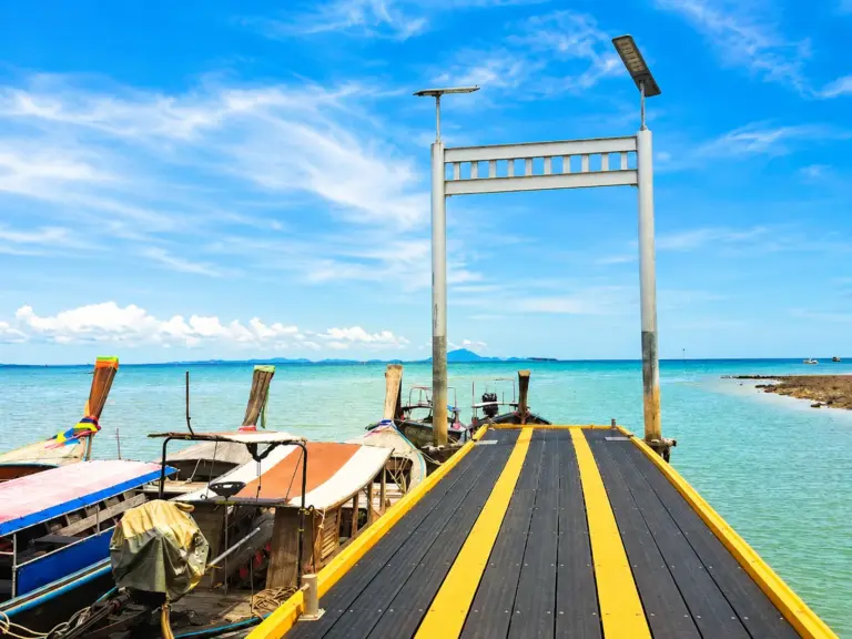Sunny Ao Nam Mao Pier with longtail boats for Railay connections